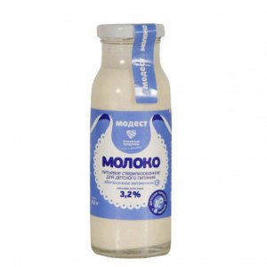 Молоко Модест стерилизованное обогащенное витамином С с 8мес 3.2% ст/б 200мл
