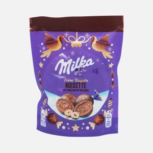 Конфеты Милка Новогодние шок яйца с лес орех 90г